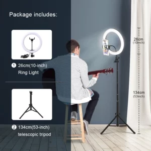 A photo of a man with a guitar and a Ring Light With Stand(12 INCH).