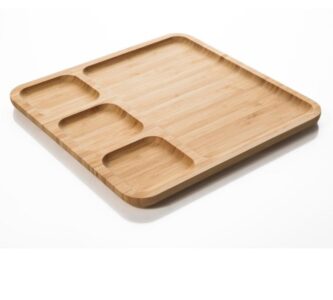 A 4 Compartment Bamboo Serving Tray with three compartments.