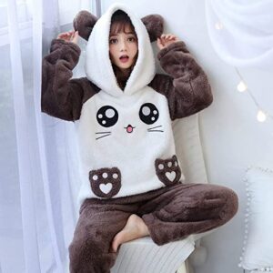 A woman wearing a cat hoodie pajamas.