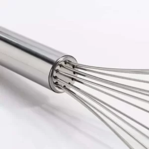 A close up of a Stainless Steel Egg Dough Mixing Mixer Tool used for mixing egg dough.