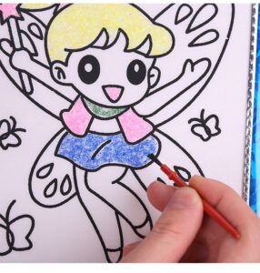 A hand holding a Children drawing Toys Mini Whiteboard with an image of a fairy.