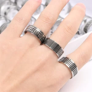 A woman's hand with a Classic Stainless Steel Ring on it.