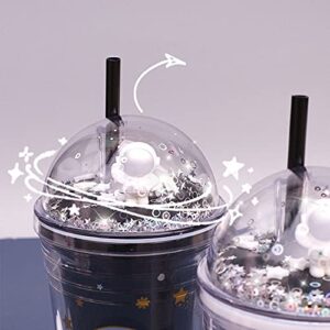 A cup with a star on it and a black straw, called the Space Galaxy Planet Astronaut Sipper.