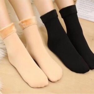 A pair of Winter Adult Warm Tube Snow Socks with fur cuffs.