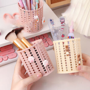 Two hands holding a Cute Stationery Organizer