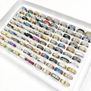 A white tray filled with many Classic Stainless Steel Rings.