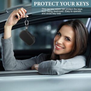 A woman holding a Keychain with Carabiner Hook in her car.