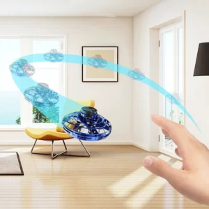 A person is pointing to a Flying Spinner Mini Drone With Led Lights in a living room.