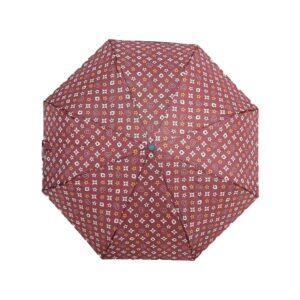 A Monogram Printed Auto Classic Umbrella with polka dots on it.