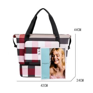 A pink and black plaid tote bag with a picture of a woman.