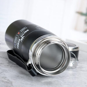 A black Double Wall Vacuum Stainless Steel Thermos with a lid.