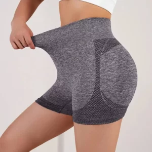 A woman wearing Seamless Yoga Short Tights with a black waistband.