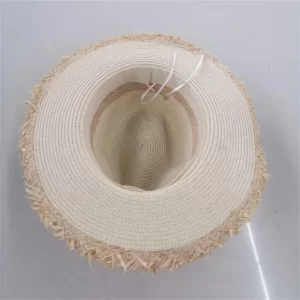 A Fashion Straw Panama Sun Hat For Women with fringes on it.