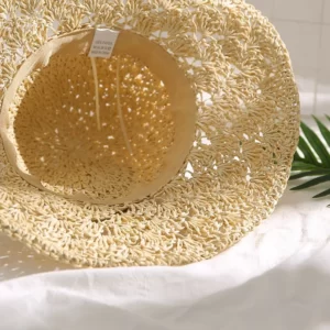 A Leaf-adorned Women's Brim Hat.