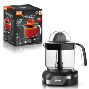 A juicer with a box in front of it.