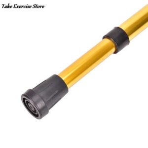 An exercise bar with a black handle and a yellow handle.