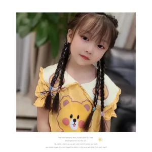 A little girl wearing a yellow Colorful Hair Braids Rope shirt.