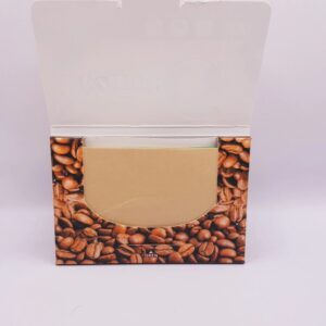 A box of coffee beans in a white box.