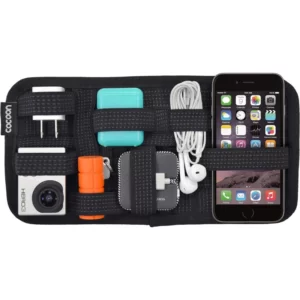 A pouch with a Grid-It! Vehicle Storage Plate Accessory Organizer, charger, and other items.