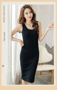 A woman is posing in a Slim waist vest bottoming dress casual fashion.
