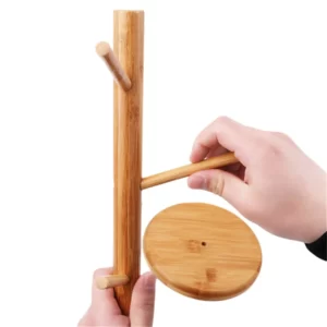 A person is holding a Bamboo Wooden Six Cup Holder Rack.